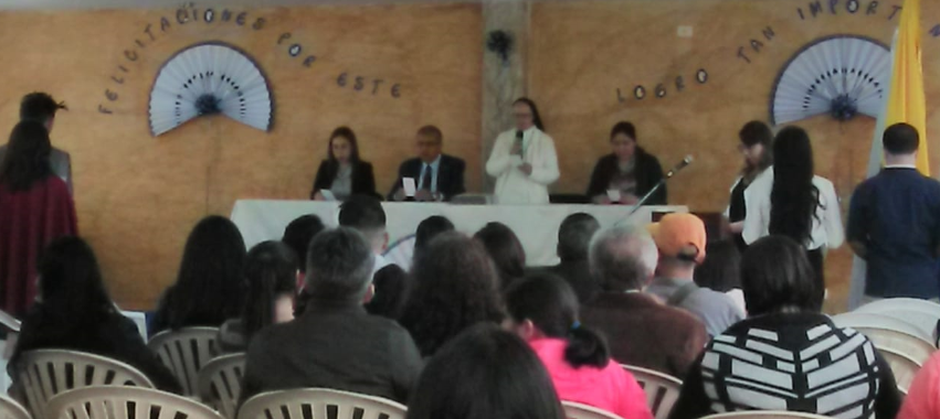 Auditorio lleno de personas.
