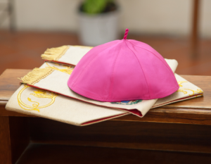 Solideo y estola católicas.